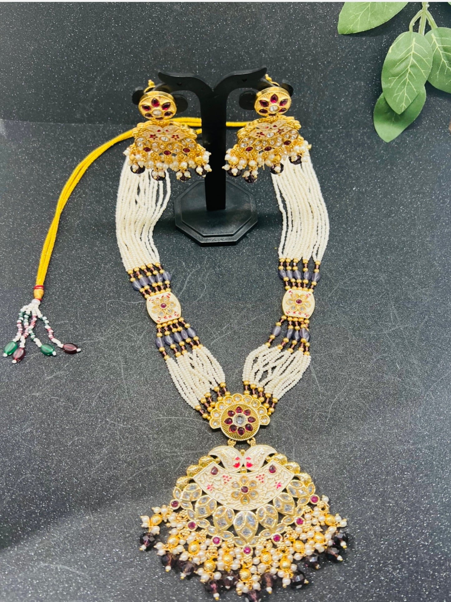 Long Pearl Necklace with earrings.
