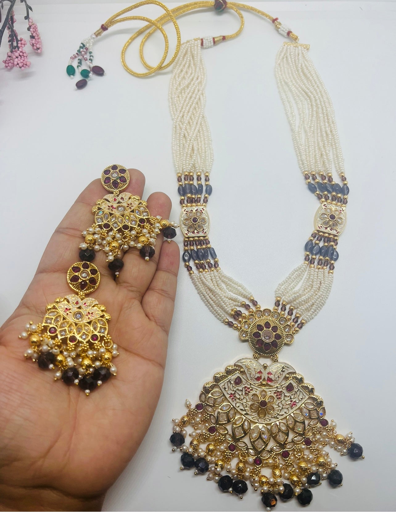 Long Pearl Necklace with earrings.
